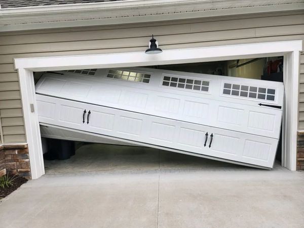 Off-track garage door emergency repair
